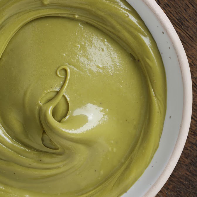 Illustrative chocolate and nut dessert photograph; replace with BISVUA pistachio cream